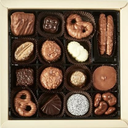A gourmet assortment of chocolates in a gift box.